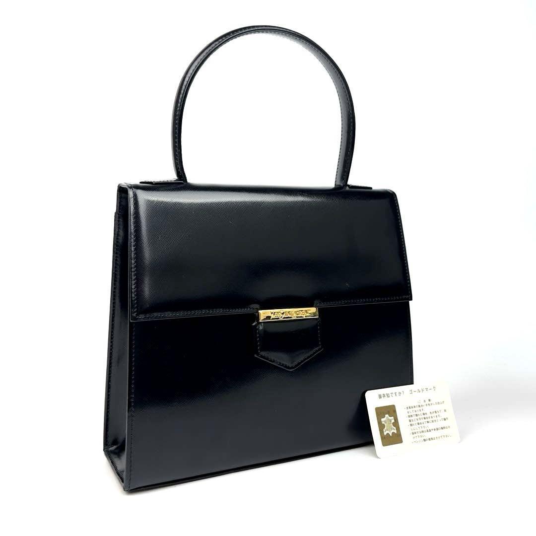 Saint Laurent ブラック レザー ハンドバッグ ゴールド 美品】Yves Saint Laurent イヴサンローラン ハンドバッグ