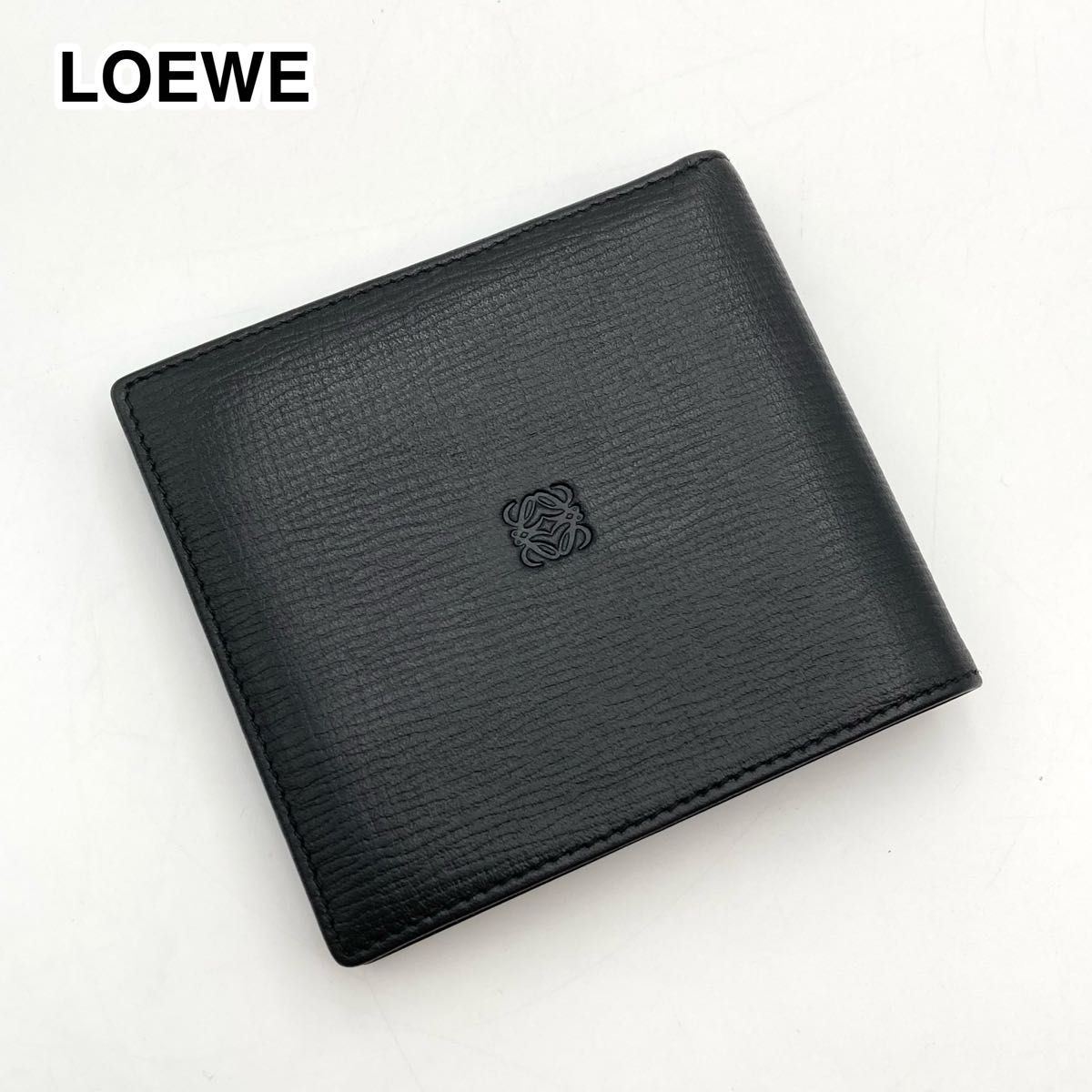 美品 ロエベ レザー 折り財布 アナグラム ロゴ 型押し ファスナー 黒 超美品・使用感少ない】 LOEWE ロエベ 二つ折り財布 レザー 黒