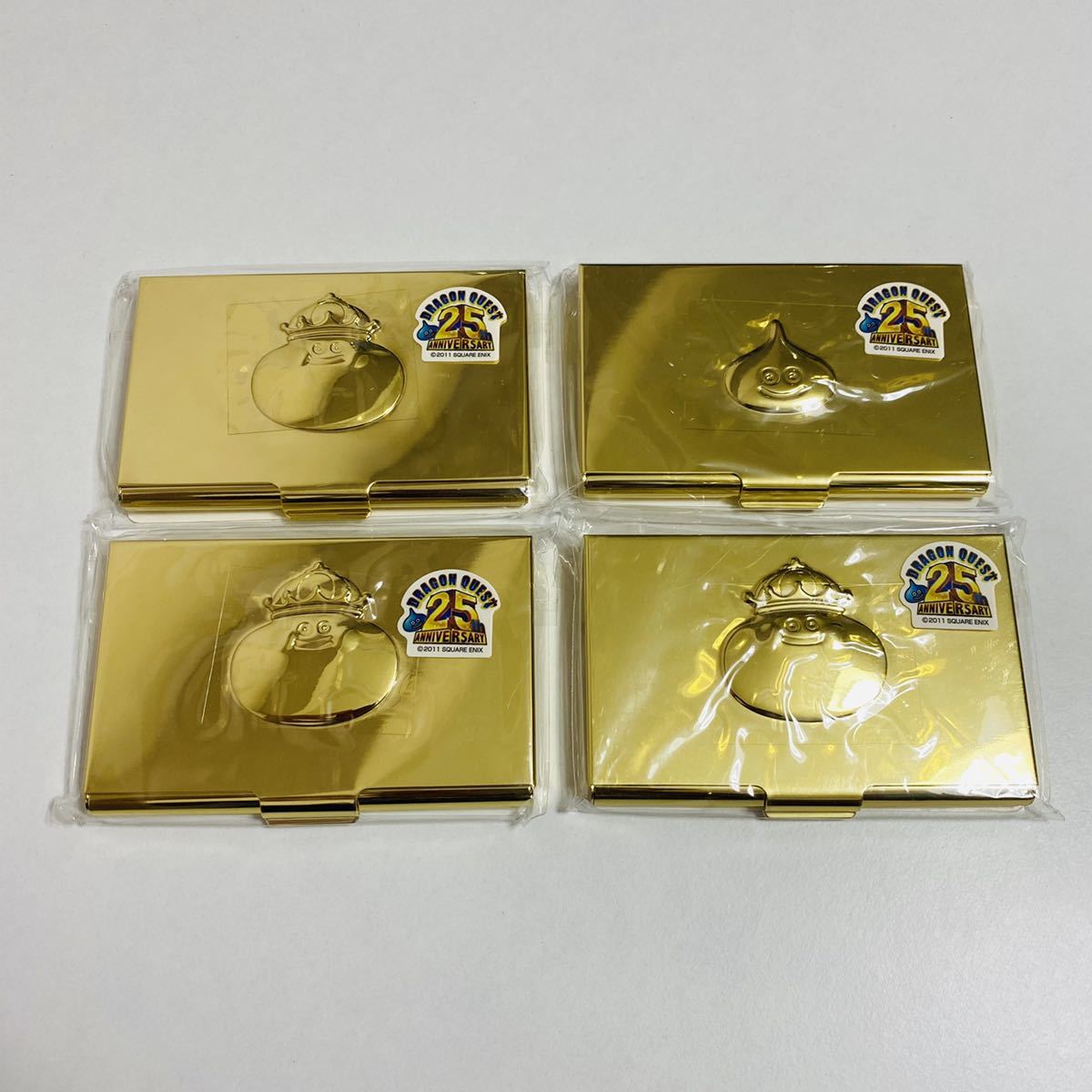 [ unopened goods ] Dragon Quest 25 anniversary commemoration item gold color card-case metal King Smile Sly m Gold 4 piece set card-case rare 