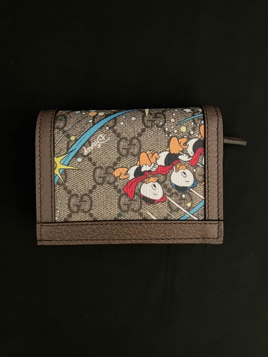 グッチ 二つ折り財布 ディズニーコラボ ドナルドダック グッチ&ディズニーコラボ ドナルドダックの二つ折り財布 正規店