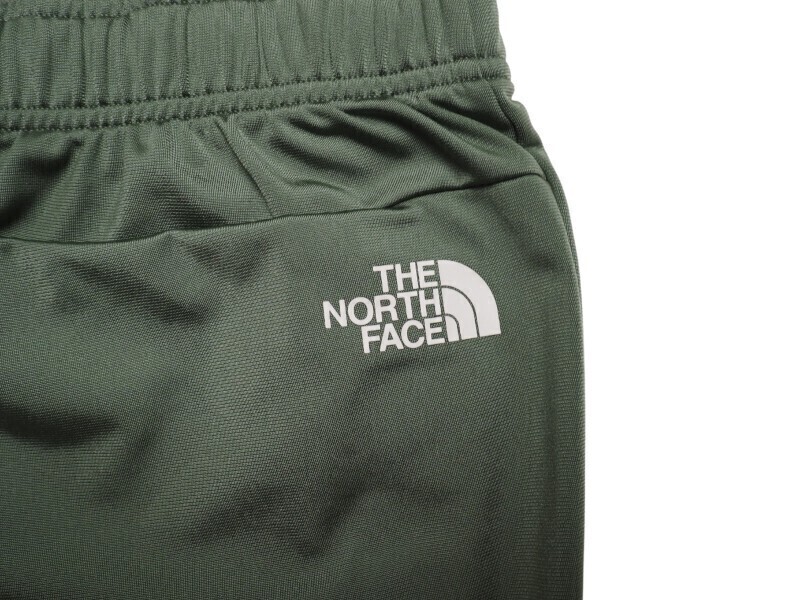 新品正規(guī) ノースフェイス ホワイトレーベル 海外限定 ビッグロゴ 光沢天竺 ALBANI ジャージパンツW85(L)カーキ(KHA)