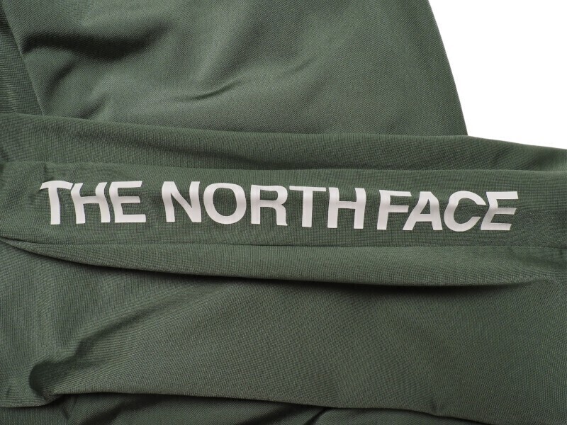 新品正規(guī) ノースフェイス ホワイトレーベル 海外限定 ビッグロゴ 光沢天竺 ALBANI ジャージパンツW85(L)カーキ(KHA)