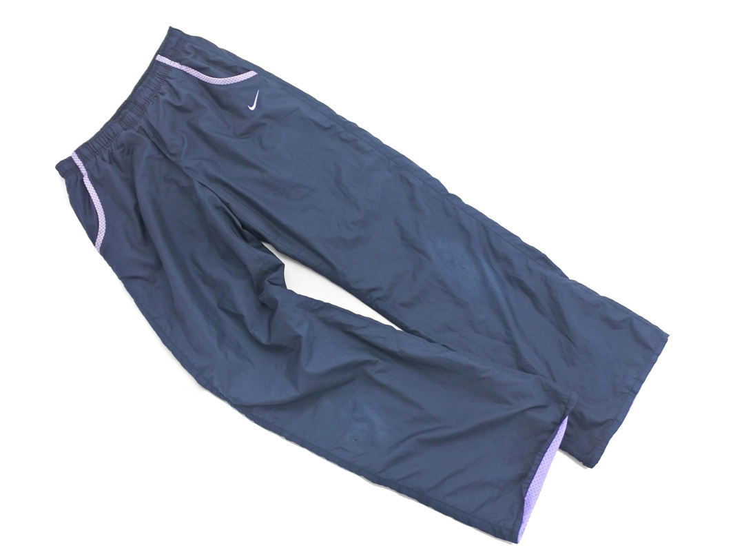 NIKE ナイキ ウインドブレーカー トラック パンツ sizeM/紺 ◇■ ☆ fhd0 レディース_画像1