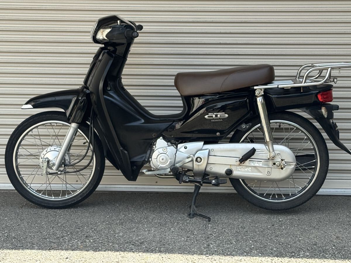 10000円より売り切り!! ホンダ スーパーカブ110 JA10 エンジン絶好調(diào) 黒色 ダブルシート キャリア追加！ ビジネスに通勤にツーリングに！