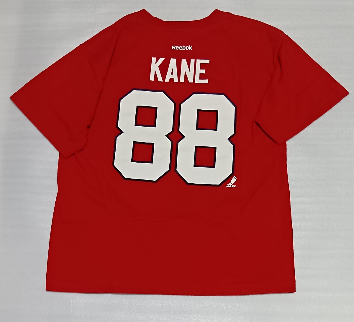 ☆Reebok サイズXL 半袖Tシャツ 赤色レッド紅カラフルNHLイラストBIGバック88プリントKANEティー白スポーツLLファッションTEE リーボック☆_画像8
