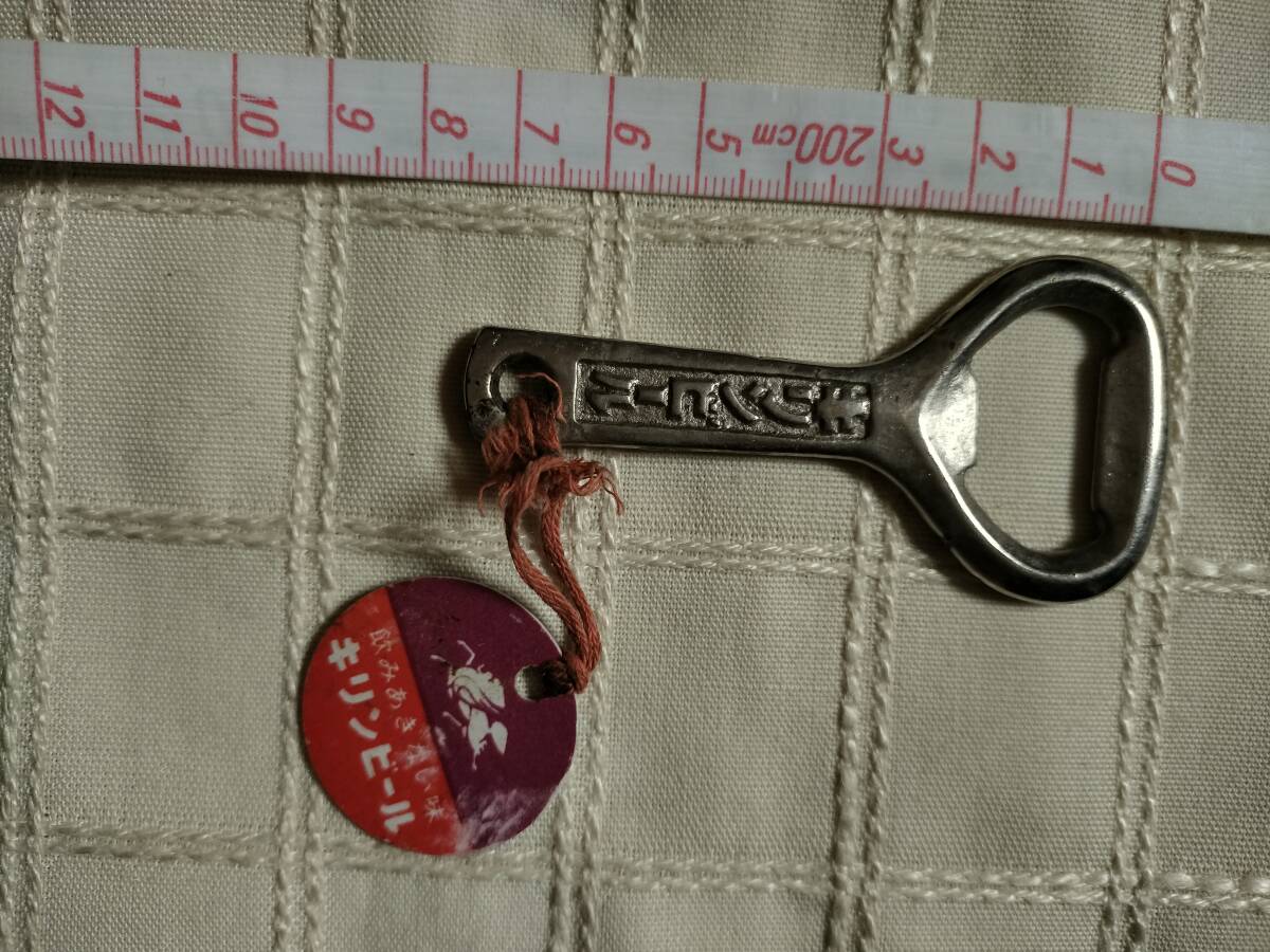 昭和レトロ　昔のキリンの栓抜き　キリンビール　キリンレモン　中古品長期自宅保管品　ひも切れかけ本体にもキズ汚れあり_画像2