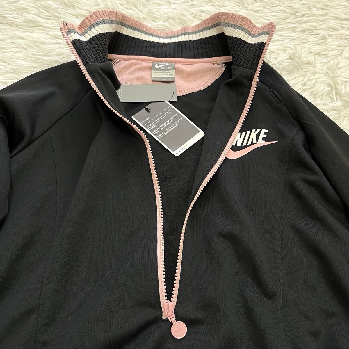NIKE ロング丈長袖トラックジャケット　新品タグ付き　イヤホンホール　レディースMサイズ　ナイキ　ブラック黒　薄手　美ライン　吸汗速乾_画像7