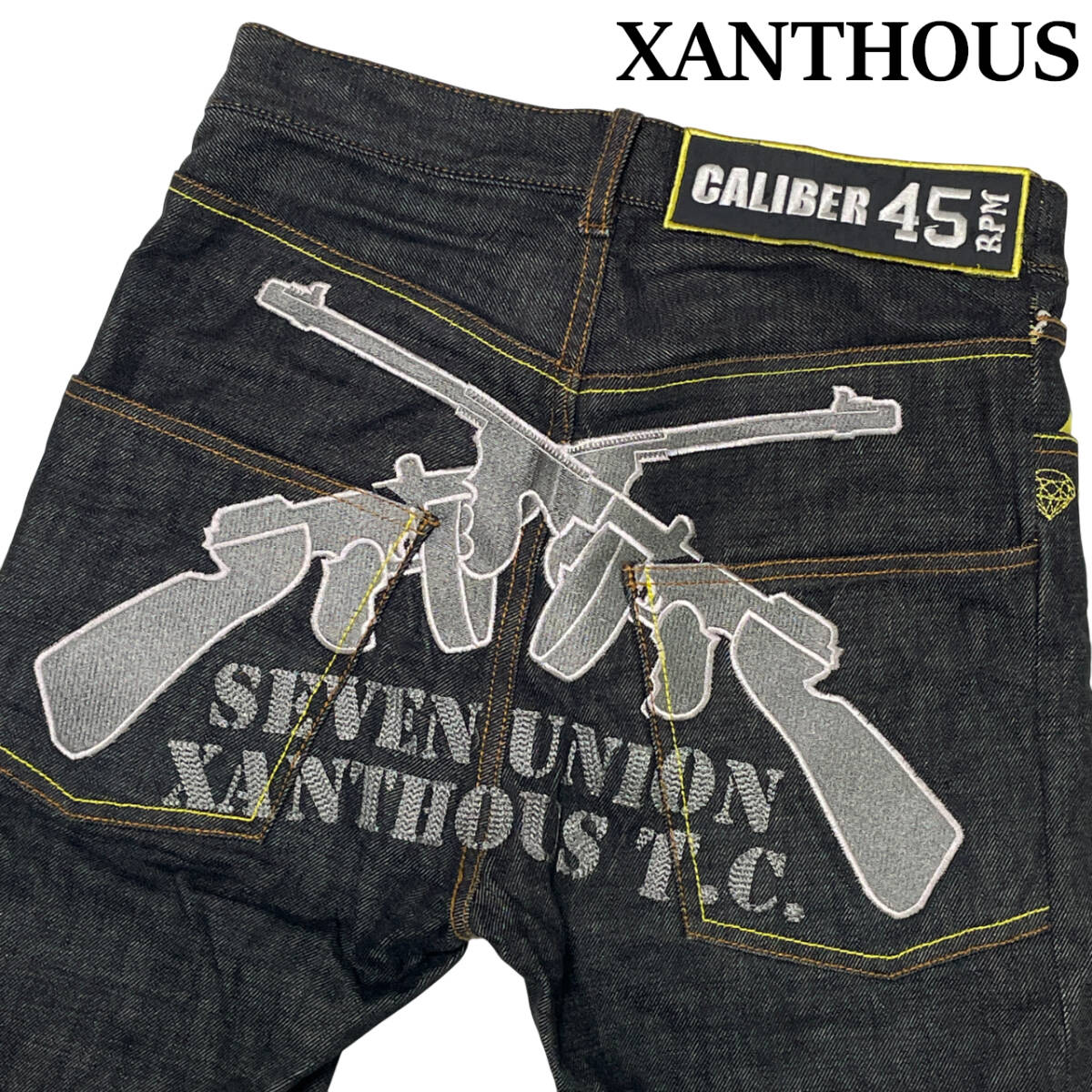 廃版 SEVEN UNION × XANTHOUS T.C 別注 刺繍 デニムパンツ サイズL (約71cm W28相当) ザンザス 赤耳 ワッペン GUN ジーンズ_画像1