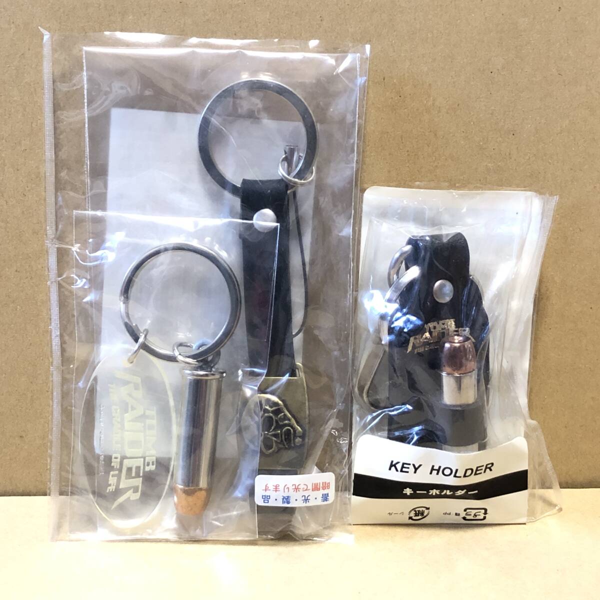 映画　トゥームレイダー　弾丸 キーホルダー セット　未使用　★★★★★送料無料★★★★★　入手困難　超レア　ダミーブレット_画像1