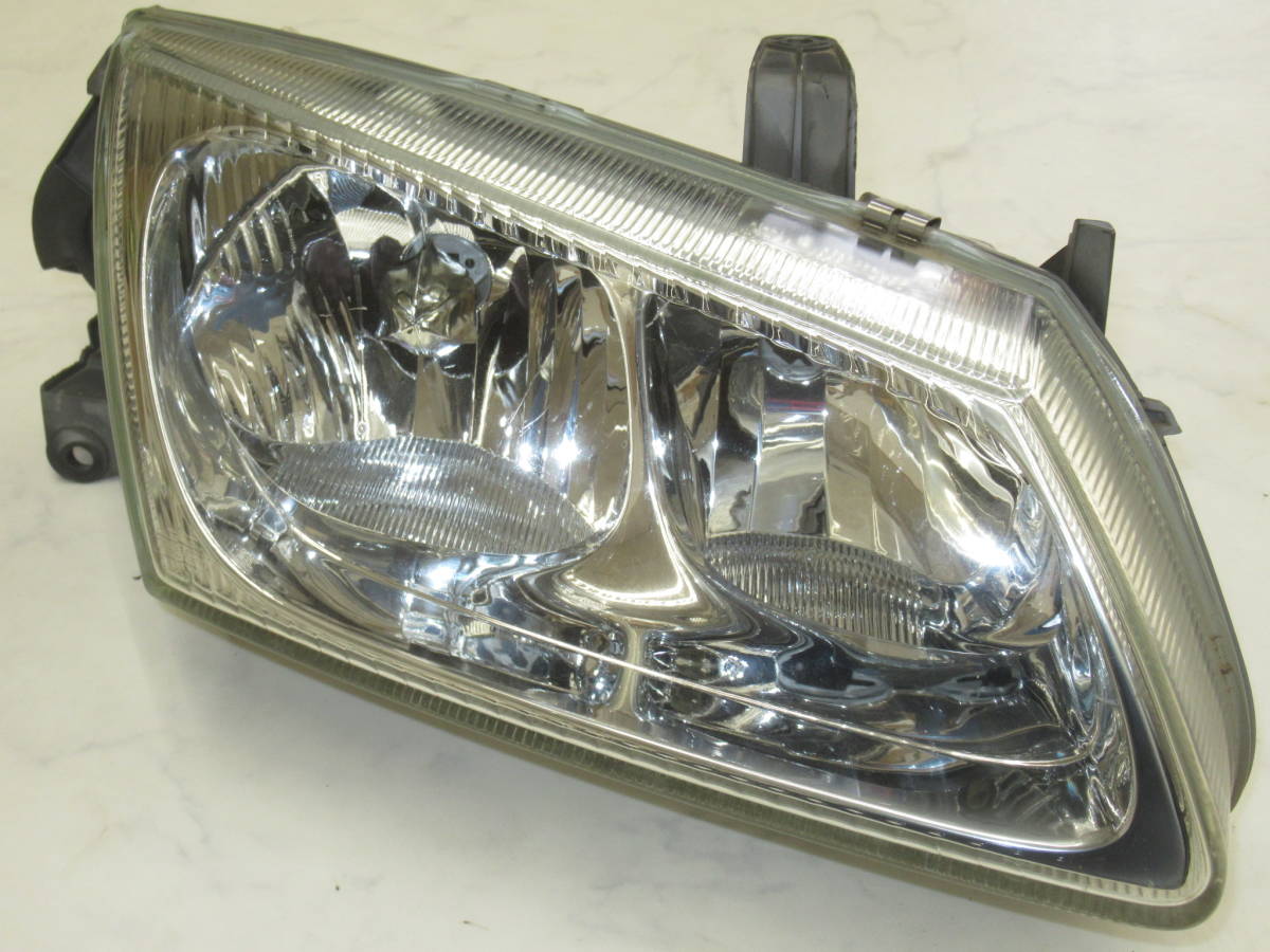  Nissan QNG10 Bluebird Sylphy original head light right side ( driver`s seat side ) only secondhand goods 26010BM810 spare . for exchange and so on! this way also possible to use!