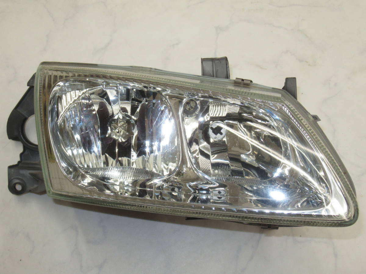  Nissan QNG10 Bluebird Sylphy original head light right side ( driver`s seat side ) only secondhand goods 26010BM810 spare . for exchange and so on! this way also possible to use!