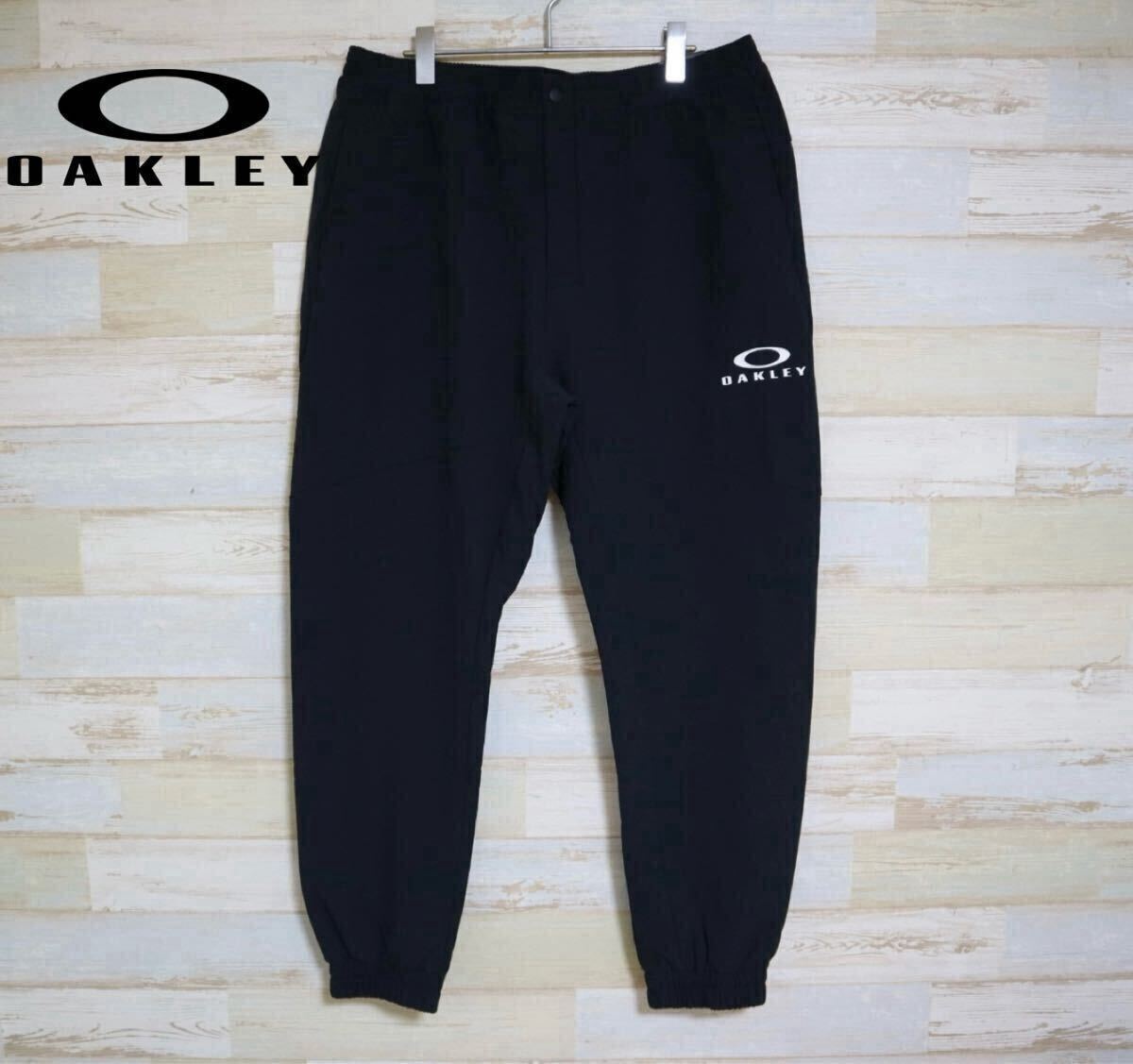 新品 定価11000円 XL(JPNサイズ) オークリー OAKLY メンズ ウインドパンツ ENHANCE TECH SHELL PANTS 1.0 FOA405853 秋冬 裏起毛 _画像1