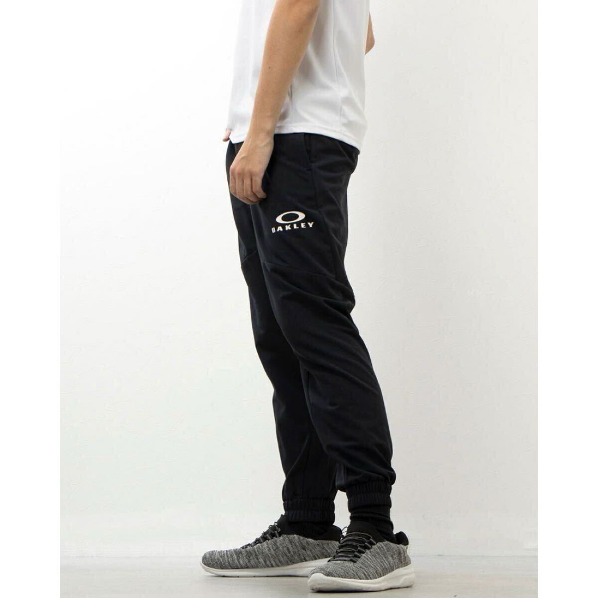 新品 定価11000円 XL(JPNサイズ) オークリー OAKLY メンズ ウインドパンツ ENHANCE TECH SHELL PANTS 1.0 FOA405853 秋冬 裏起毛 _画像2