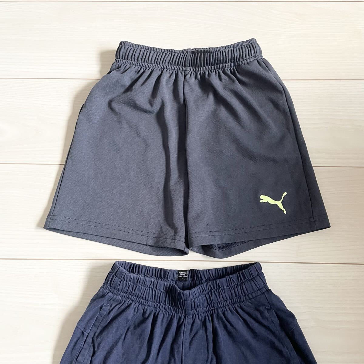 PUMA◆ハーフパンツ 2枚セット ネイビー グレー 130 2着 まとめ売り プーマ 短パン スポーツ 速乾 コットン 綿 ウエストゴム_画像2