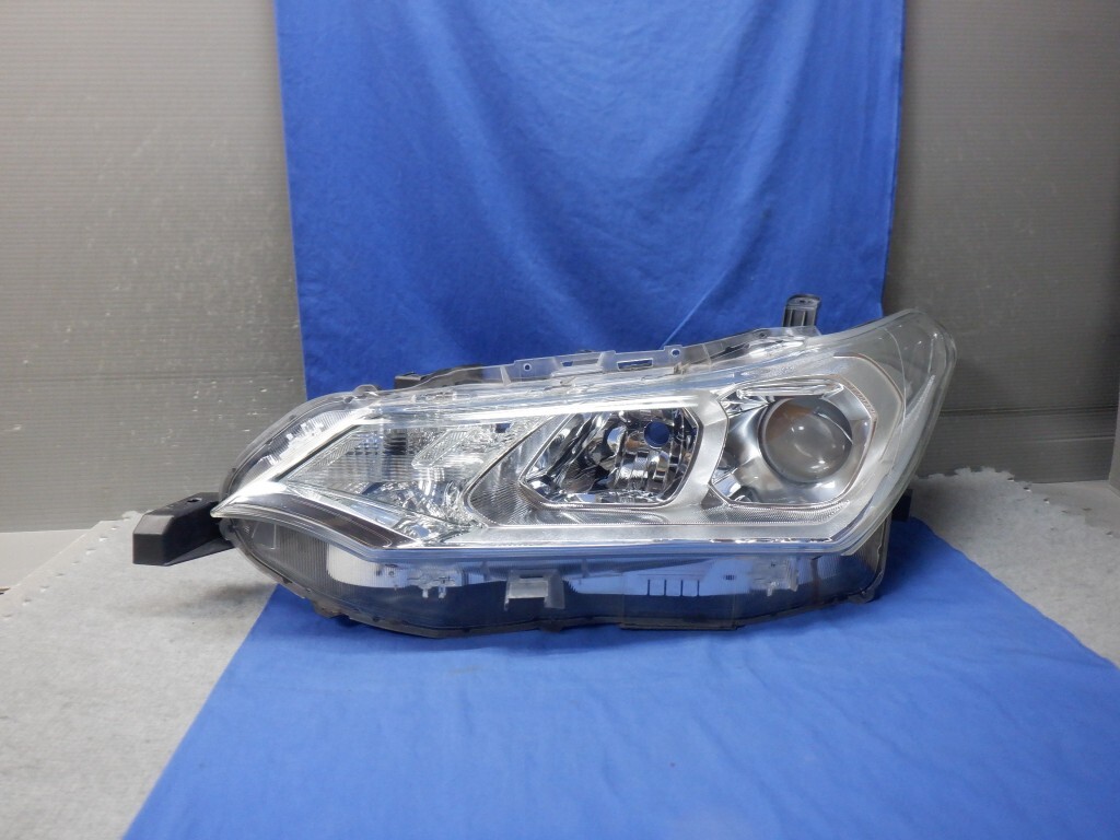 アクシオ/フィールダー　NZE161/NRE160/NKE165　後期　左ヘッドライト　ハロゲン　12-595　K (X4159)_画像1