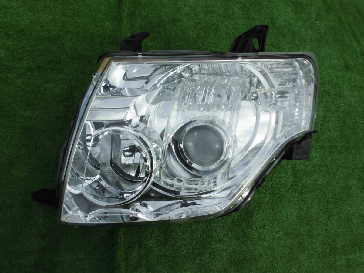 V93W V98W Pajero левая передняя фара HID Koito 100-67016 V93W V98W Pajero левая передняя фара HID Koito 100-67016