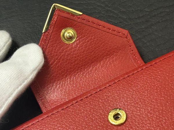 ◆ブランド◆イヴサンローラン Yves Saint Laurent★ヴィンテージ 二つ折り財布 がま口 赤色★未使用 保管品 ◆全文を必読ください■_画像9