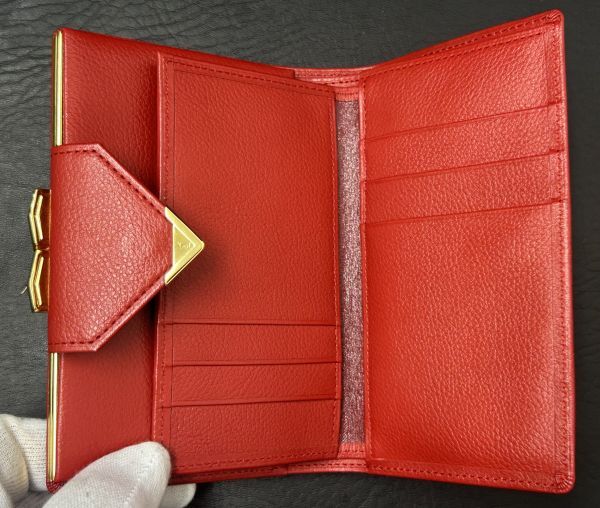 ◆ブランド◆イヴサンローラン Yves Saint Laurent★ヴィンテージ 二つ折り財布 がま口 赤色★未使用 保管品 ◆全文を必読ください■_画像4