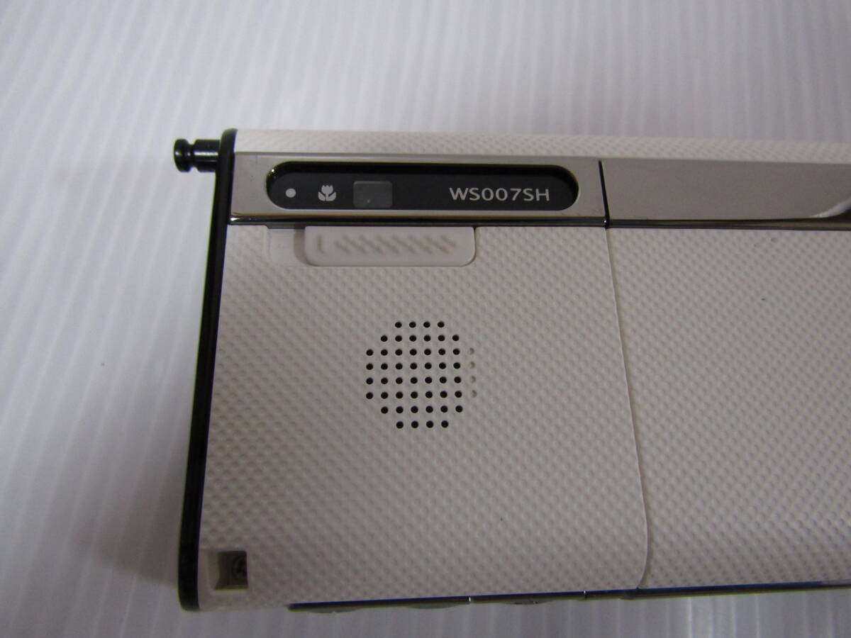 K0566 WILLCOM BLADE WS007SH ホワイト 携帯電話本体_画像5