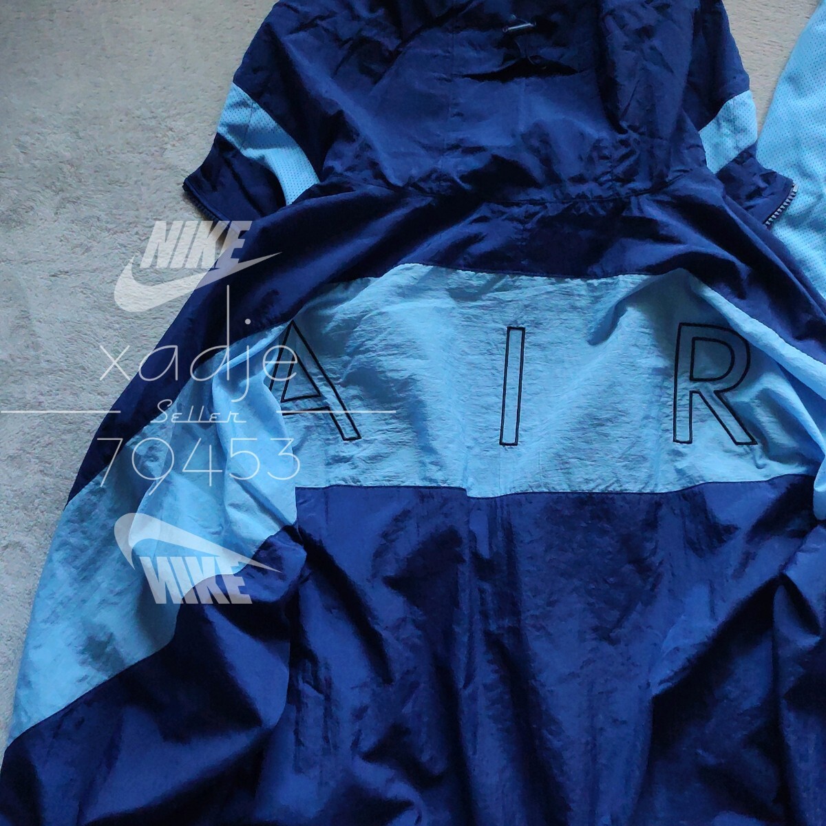 新品 正規品 NIKE AIR ナイキ 上下セット ナイロン パーカー パンツ セットアップ 紺 ネイビー 水色 裏地メッシュ 定価26070円 2XL XXL_画像2