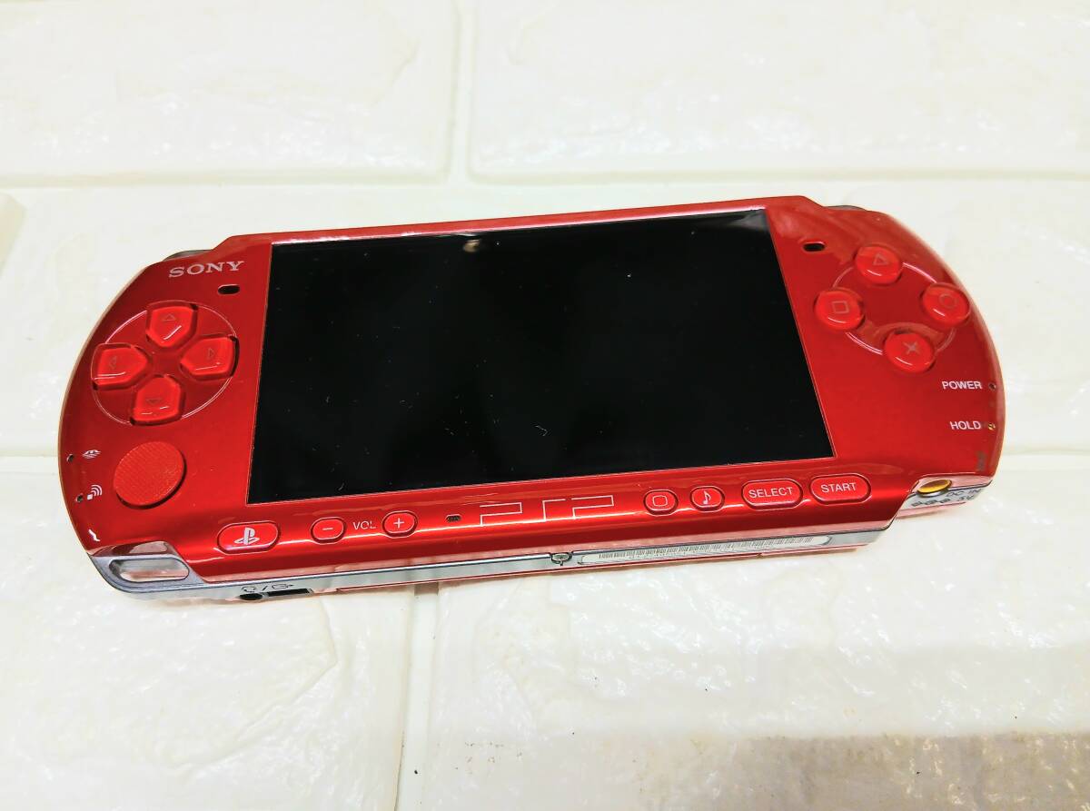 n175【現状/ジャンク品】SONY/ソニー プレイステーションポータブル PSP-3000 PSP (レッド) _画像1