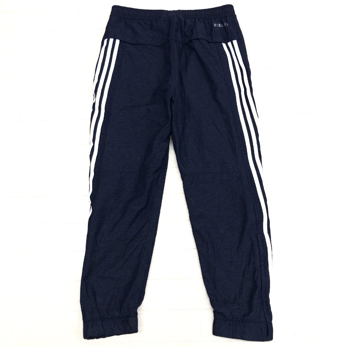 美品 adidas アディダス 定価9,350円 WINDRDY 24/7 ウインドブレーカー パンツ L 濃紺 ナイロン ジャージ ウーブン トラックパンツ メンズ_画像1