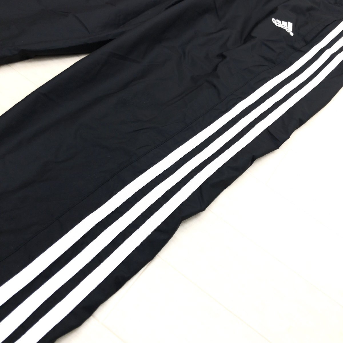 adidas アディダス 定価6,039円 WIND.RDY 蓄熱里地 3ストライプス ウインドブレーカー パンツ M 黒 ジャージ トラックパンツ メンズ 紳士