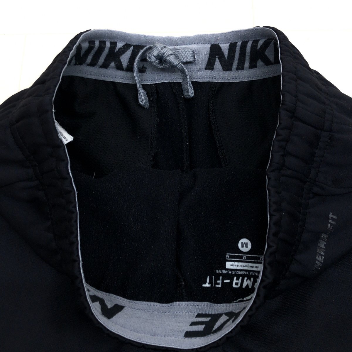 ●NIKE ナイキ THERMA-FIT ロゴ刺繍 裏起毛 ジャージ トレーニングパンツ M 黒 ブラック トラックパンツ ウォームアップ スポーツ メンズ_画像8