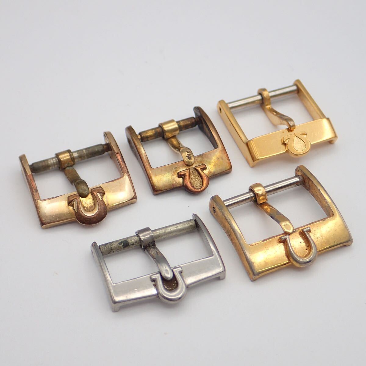 お09184【時計屋引き上げ品】OMEGA オメガ/腕時計用/尾錠のみ/純正/ラグ幅 約12～16㎜/ゴールド/シルバー/まとめて/計5点セット_画像1