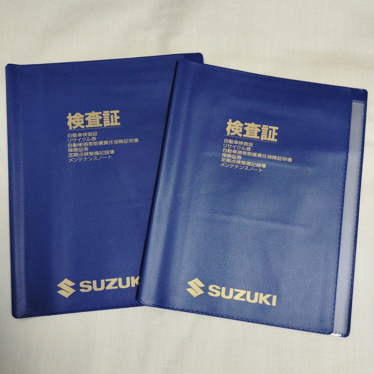 新品 2枚セット■ SUZUKI スズキ 純正 車検証入れ 車検証ケース 取扱説明書入れ 収納ケース カバー ■販売店名記載無しタイプ_画像1