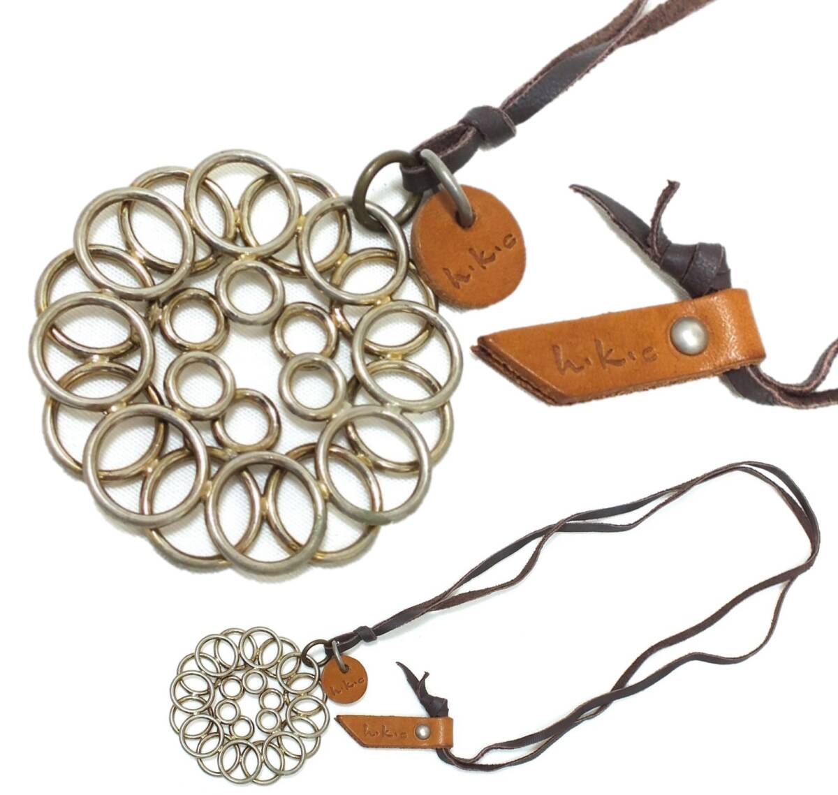 ■h.k.c ホークカンパニー HAWK COMPANY 革ひも ペンダント■重ねリング レザータグ ロゴ入り■アジアン雑貨 エスニック 革紐 ネックレス■_画像1