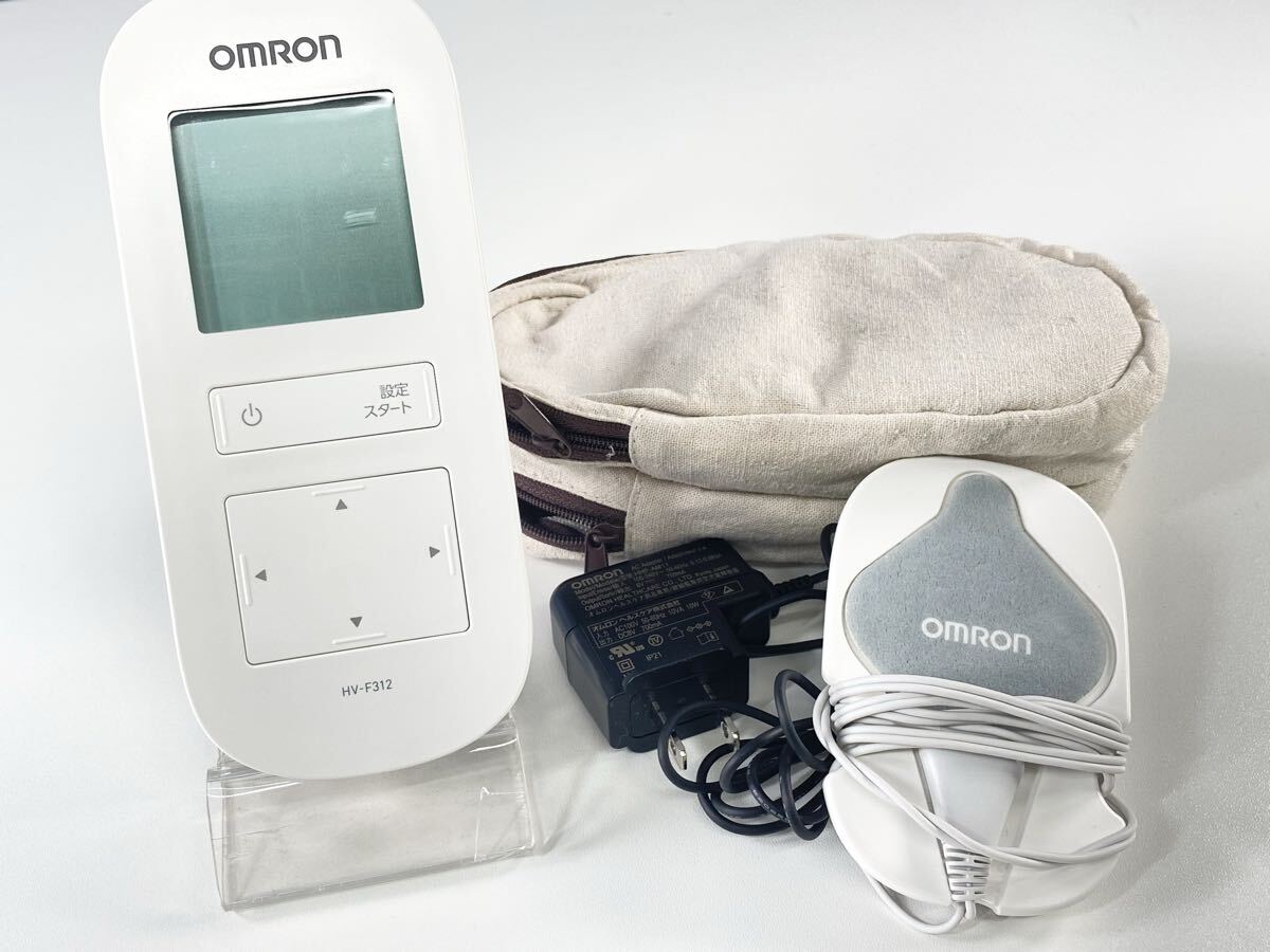 ★動作確認済み OMRON オムロン 温熱低周波治療器 HV-F312 家庭用 ホワイト マッサージ器 温熱 低周波 ケース付き 現状品 中古品 管理KA652_画像1