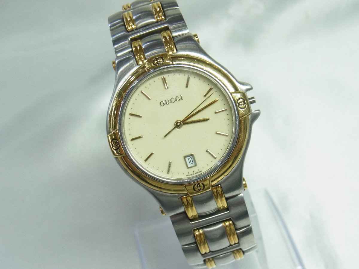 1円～【稼働・リューズ欠損】グッチ GUCCI 5500M 6石 Cal.955.412 フォーマルウォッチ メンズ 腕時計 クオーツ ３針 デイト ラウンド SSｘG_画像1