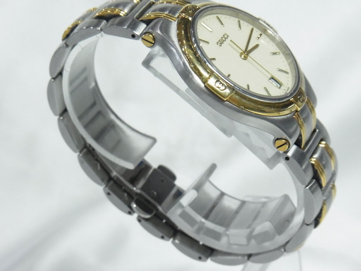 1円～【稼働・リューズ欠損】グッチ GUCCI 5500M 6石 Cal.955.412 フォーマルウォッチ メンズ 腕時計 クオーツ ３針 デイト ラウンド SSｘG_画像4