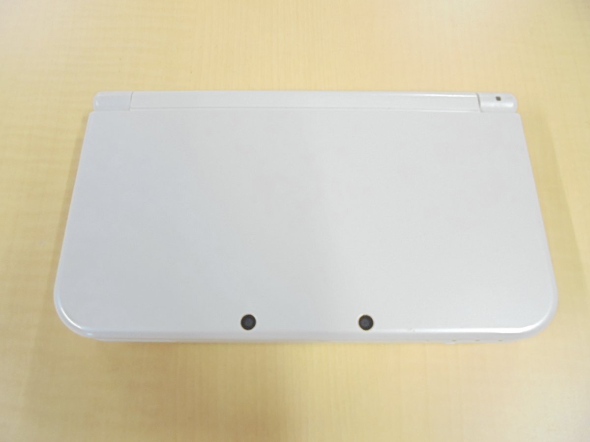 【80】1円～NINTENDO 任天堂 new NINTENDO 3DS LL ホワイト RED-001 キズ 汚れ タッチペンなし カセット1個付き 動作未確認 ジャンク扱い_画像1