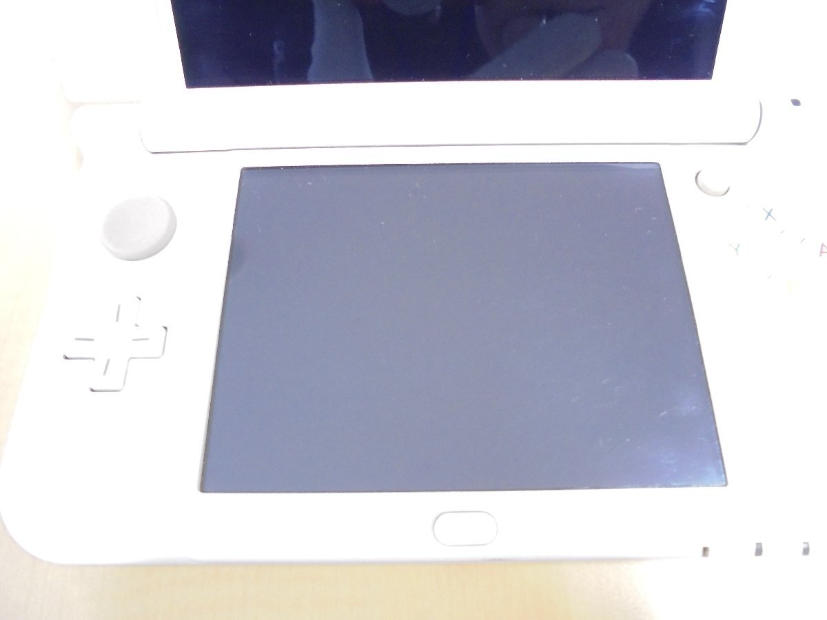 【80】1円～NINTENDO 任天堂 new NINTENDO 3DS LL ホワイト RED-001 キズ 汚れ タッチペンなし カセット1個付き 動作未確認 ジャンク扱い_画像3
