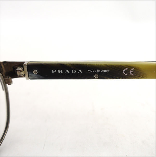 # Prada раз имеется очки Logo plate темно-красный titanium (0990014263)