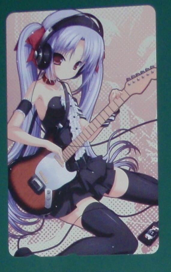 ＃:テレカ「１１ｅｙｅｓ CROSS OVER　Ｂ」【ちこたむ他】_画像1