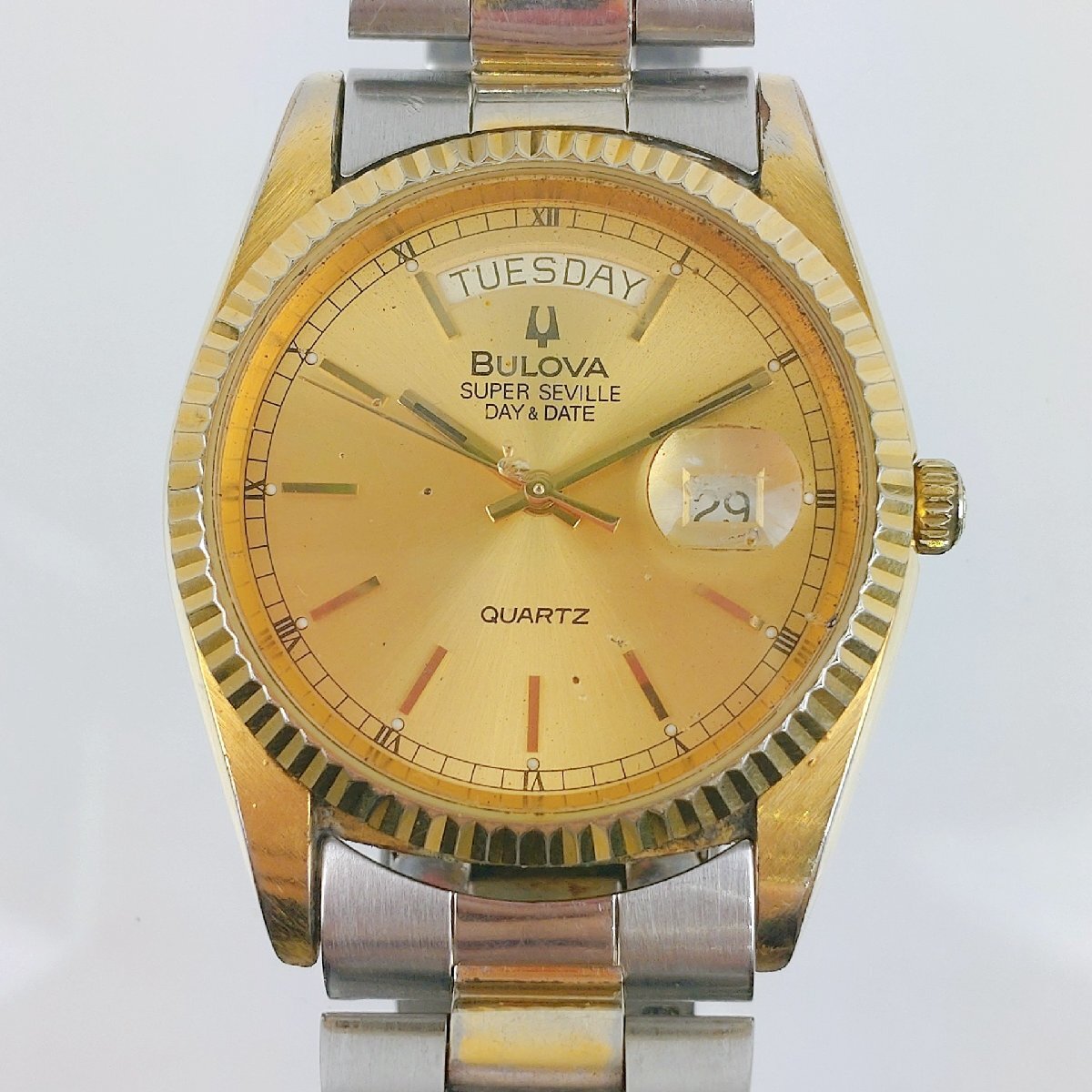 [稼働品] BULOVA　SUPER SEVILLE　クオーツ　デイデイト　ゴールドカラー　社外ベルト　ブローバ　スーパーセビル_画像1