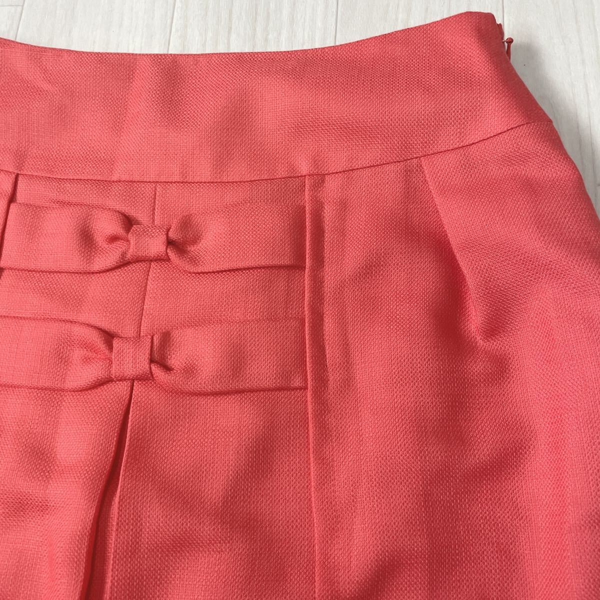 【美品】CROLLA クローラ 日本製 台形スカート 膝上丈 ミニスカート サイドファスナー コーラルピンク サイズ38 春夏秋 ワールド 薄手_画像3