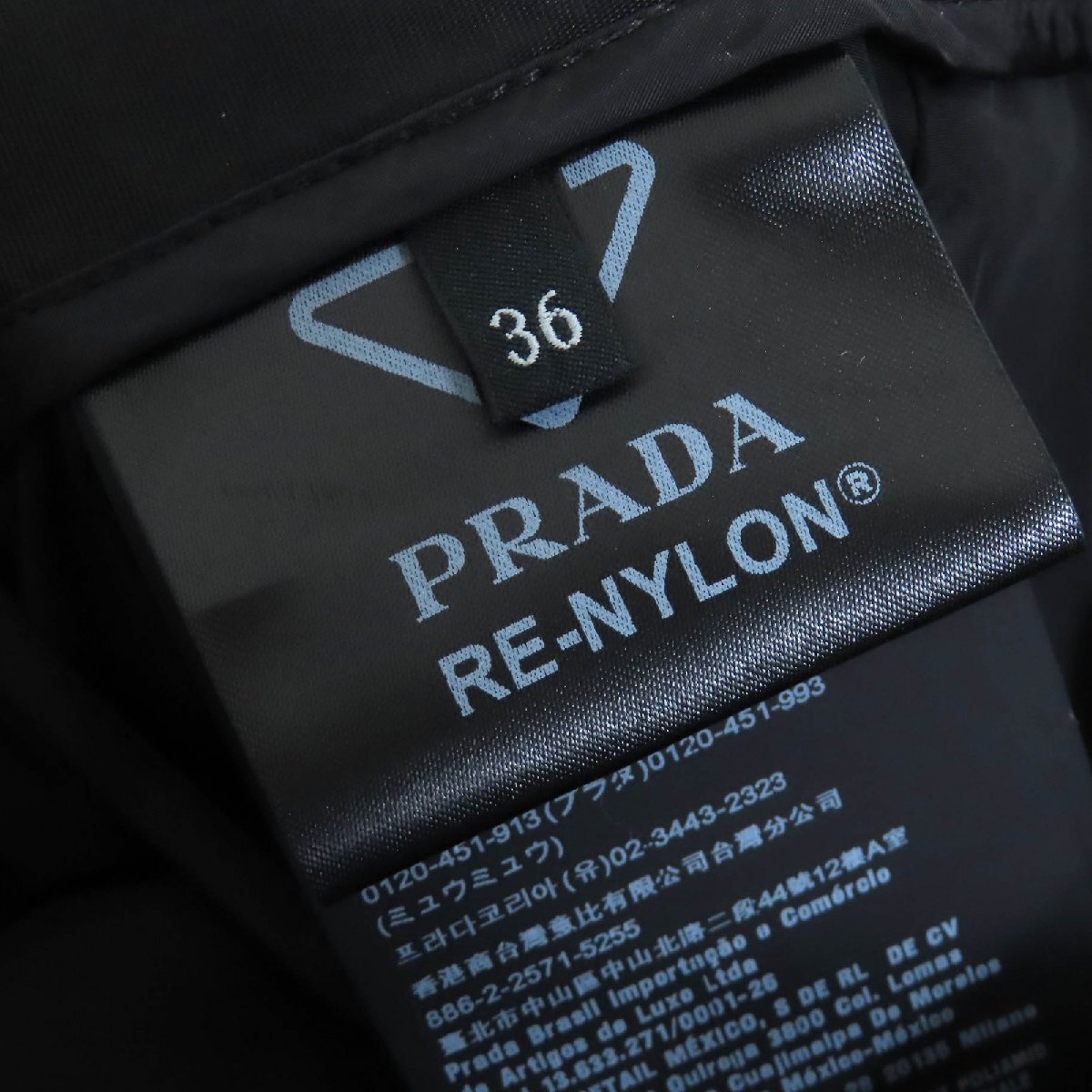  прекрасный товар ^PRADA Prada 2022 год производства 21H924 треугольник Logo треугольник plate Re Nylon длинный узкая юбка черный 36 стандартный товар женский 