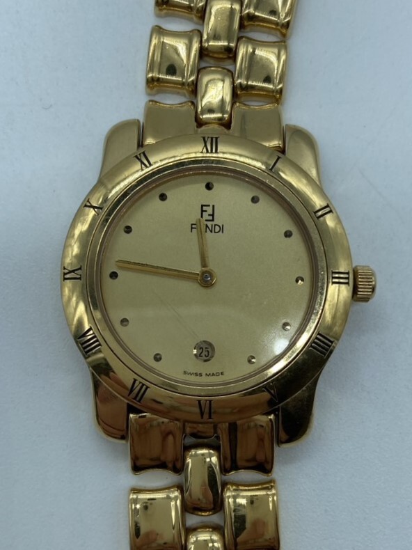不動品 FENDI フェンディ メンズ レディース 腕時計 860J デイト クォーツ FFロゴ ラウンド ゴールド系 文字盤_画像1