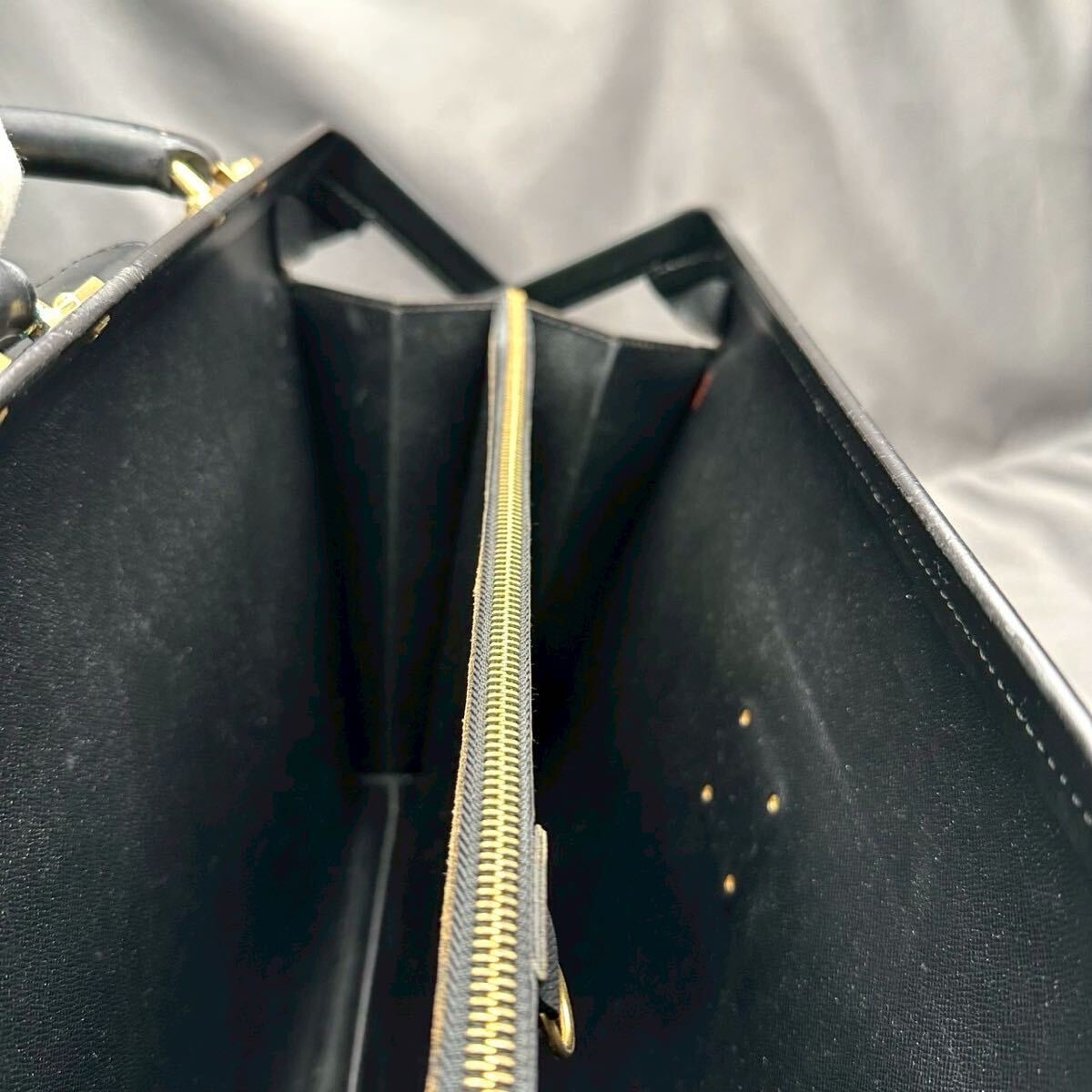 B111 LOUIS VUITTON ルイヴィトン エピ ビジネスバッグ セルヴィエット フェルモワール シリアル MI0070_画像7