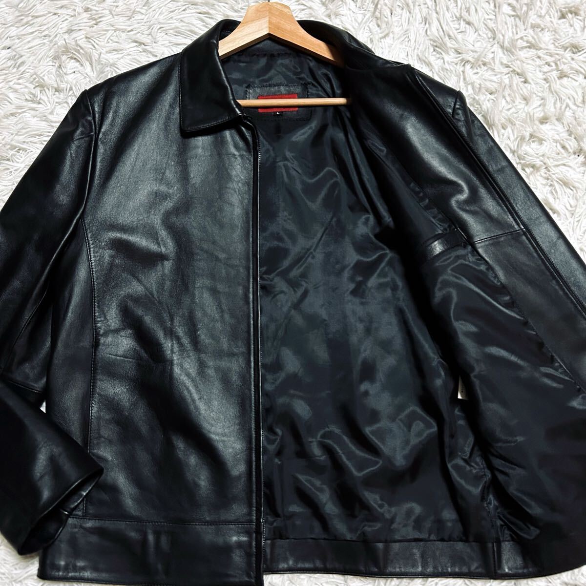 沈黙の黒翼★極美品/Lサイズ 極上のラムレザー レザージャケット ライダース シングル ブルゾン アウター 本革 羊革 ブラック 黒 高級感_画像1