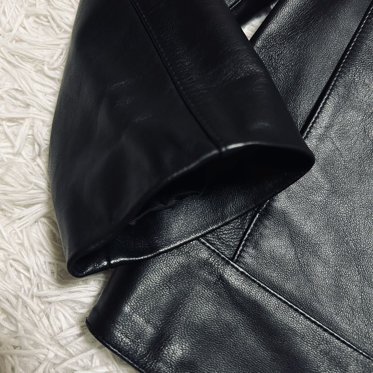 沈黙の黒翼★極美品/Lサイズ 極上のラムレザー レザージャケット ライダース シングル ブルゾン アウター 本革 羊革 ブラック 黒 高級感_画像3