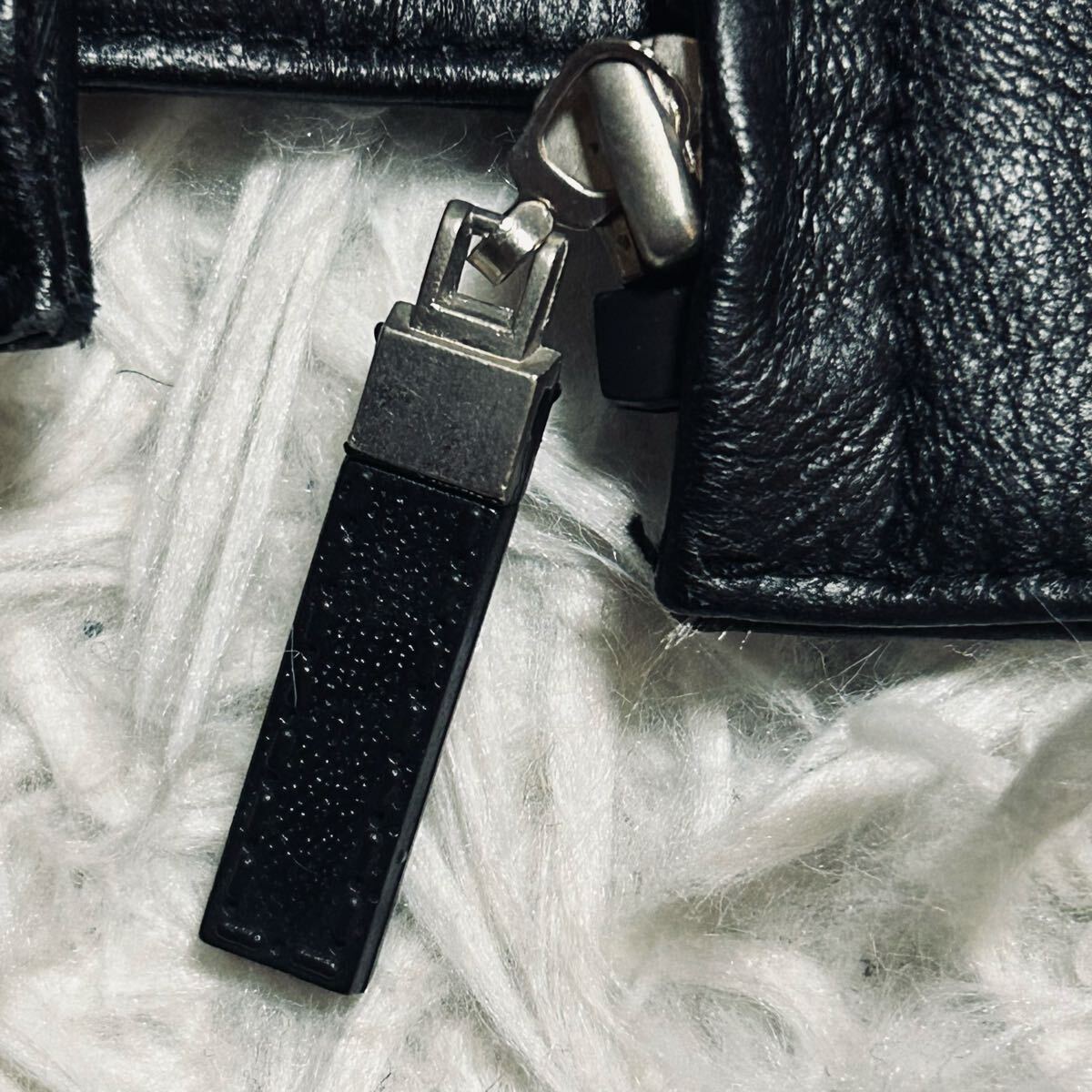 沈黙の黒翼★極美品/Lサイズ 極上のラムレザー レザージャケット ライダース シングル ブルゾン アウター 本革 羊革 ブラック 黒 高級感_画像6