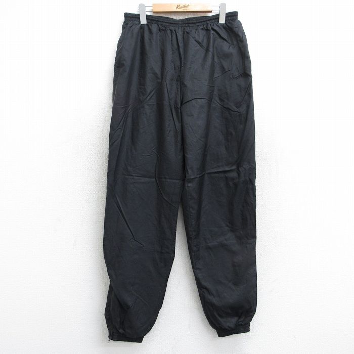 W34/古着 ナイキ NIKE ナイロン パンツ メンズ 00s ワンポイントロゴ 黒 ブラック 25oct28 中古 ボトムス ロング_画像1