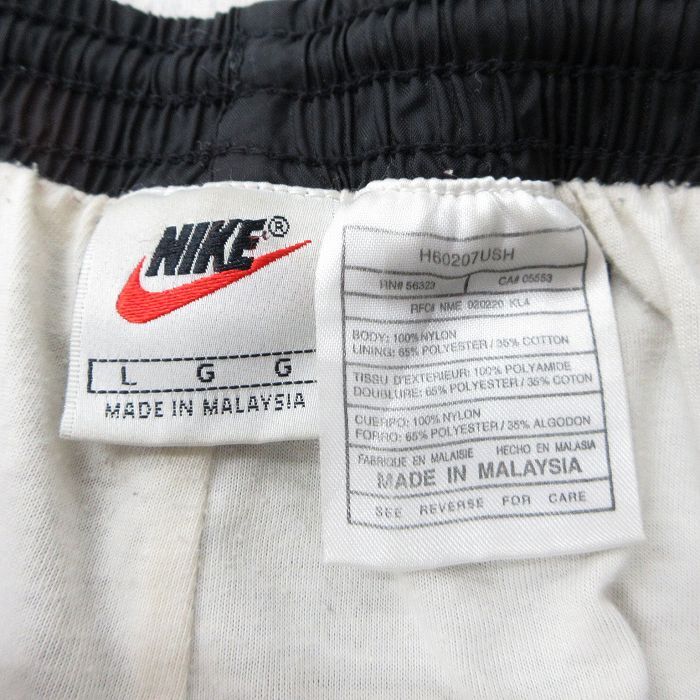 W34/古着 ナイキ NIKE ナイロン パンツ メンズ 00s ワンポイントロゴ 黒 ブラック 25oct28 中古 ボトムス ロング_画像4