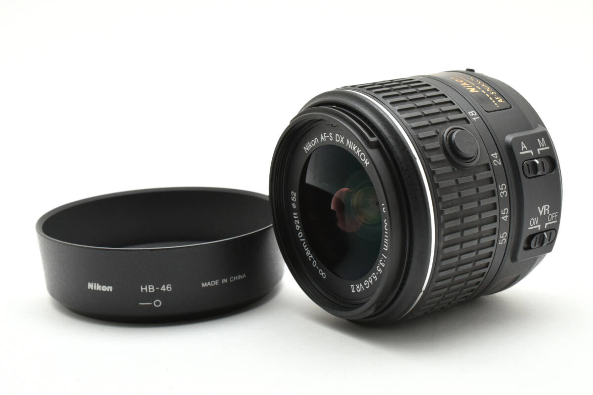 Nikon AF-S DX ニッコール カメラレンズ 18-55mm f3.5-5.6 G VR II ブラック フード付き ニコン 404_画像1