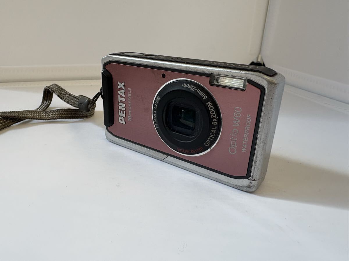 早708-156 PENTAX デジタルカメラ Optio W60 ジャンク ペンタックス ピンク_画像1